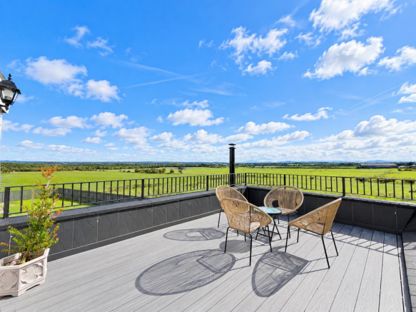 Upper TV/Balcony Area