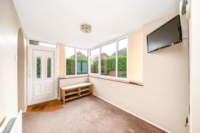 REAR ENTRANCE LOBBY / GARDEN ROOM