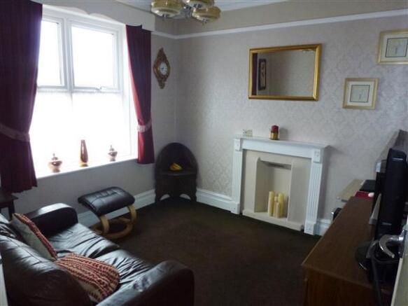 FRONT SITTING ROOM :