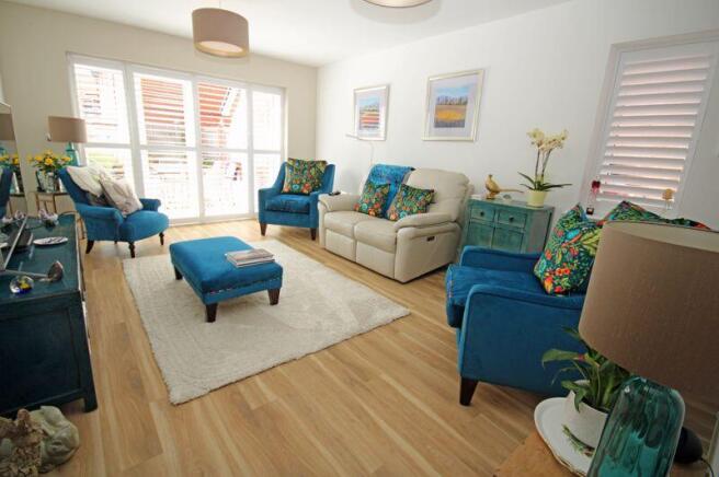 Sitting room with french doors to garden