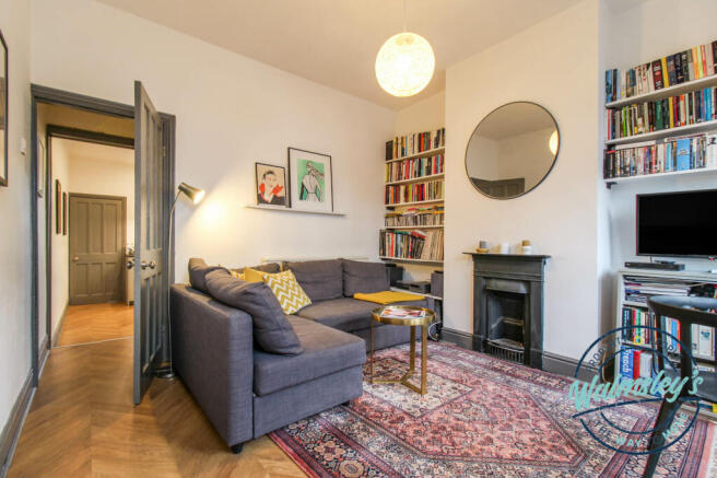 Front sitting room through to staircase & rear gar