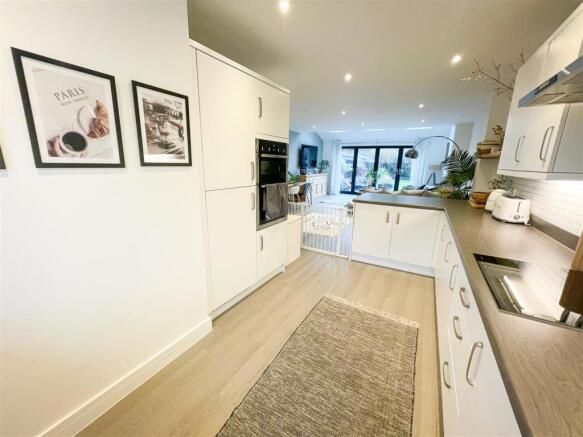 ALTERNATE VIEW OF KITCHEN AREA