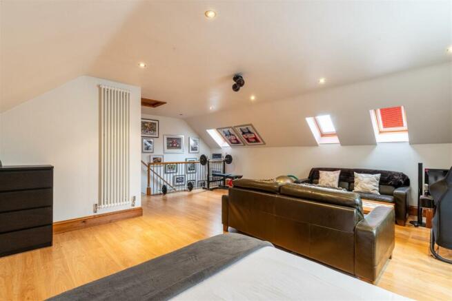 Bedroom Five (above the garage)