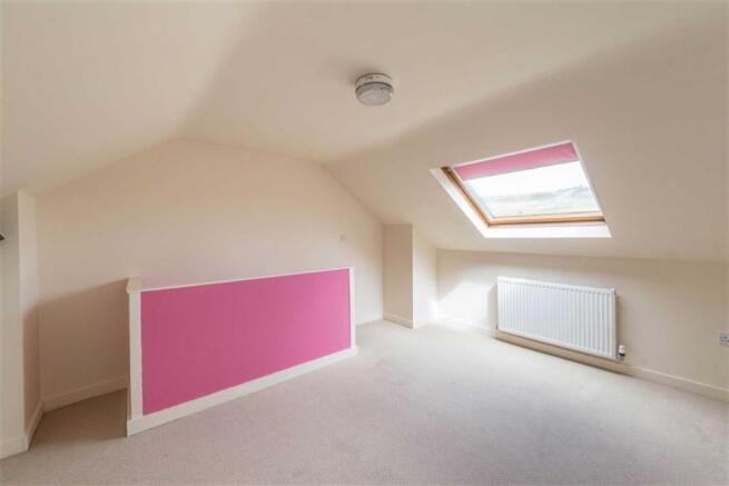 SECOND FLOOR ATTIC BEDROOM THREE