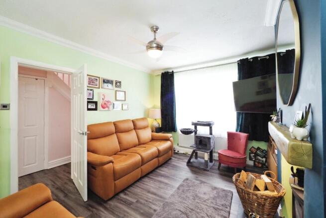 Tastefully decorated lounge with cosy log burner