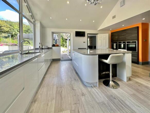 Kitchen Towards Living Room & Gardens.JPG