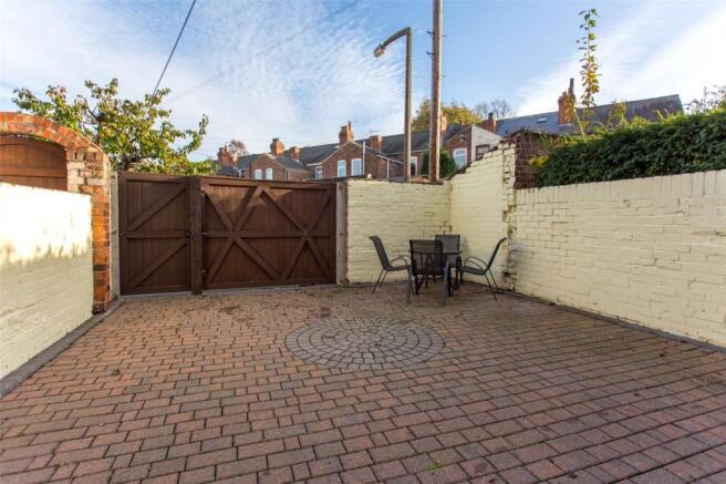 Rear Yard & Driveway
