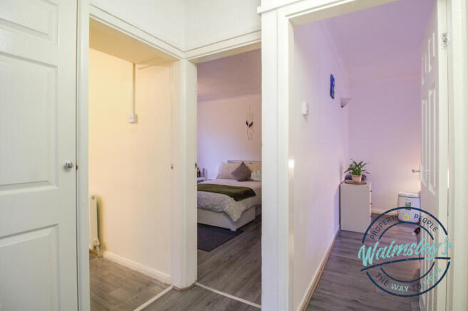 Hallway & access to kitchen bedrooms bathroom and 