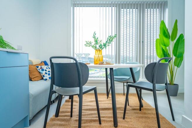 Bright social space with a chic dining area...