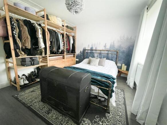 ALTERNATE VIEW OF BEDROOM ONE