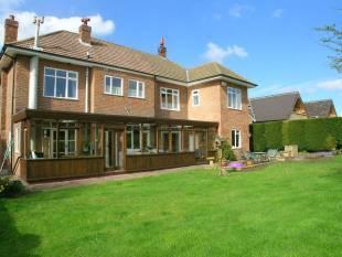 REAR VIEW AND GARDEN