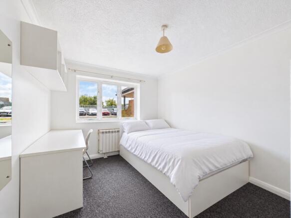 Bright Minimalist Bedroom with Window View