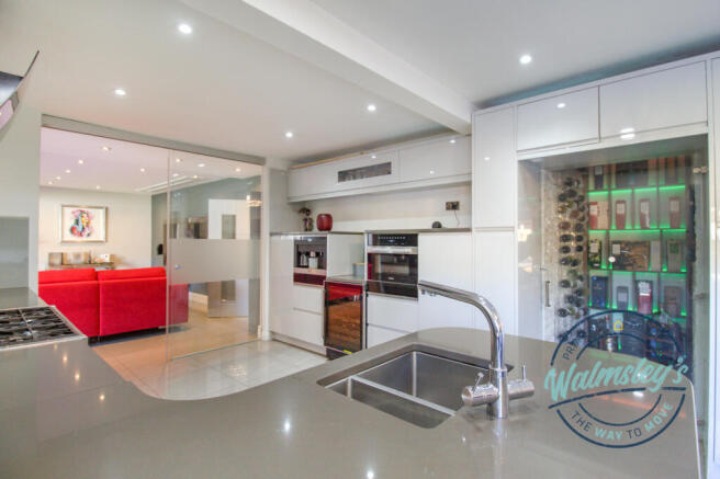 Kitchen with walk in wine cooler