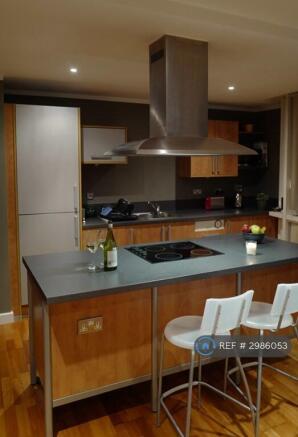 Kitchen With Island And Breakfast Bar