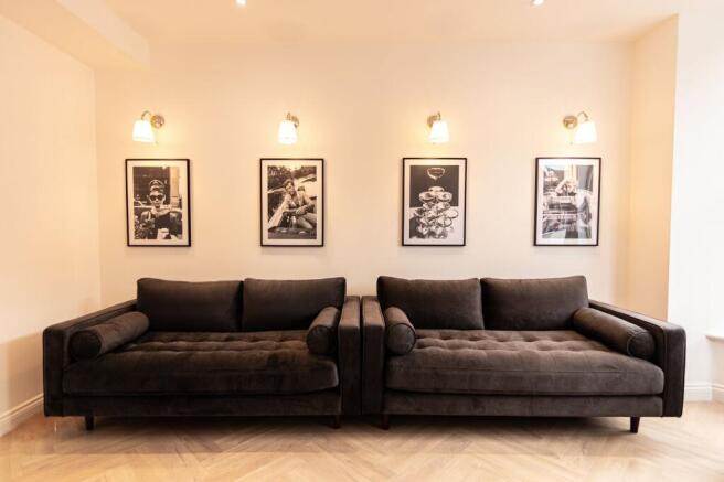 A stylish and welcoming living room featuring t...