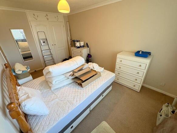 Bed 1 to wardrobe