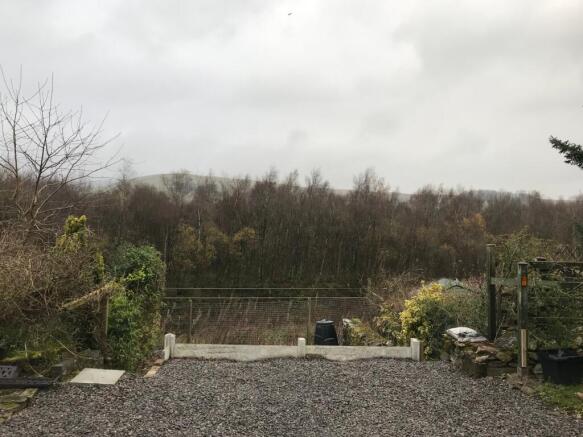 Car Parking And Lower Gravel garden