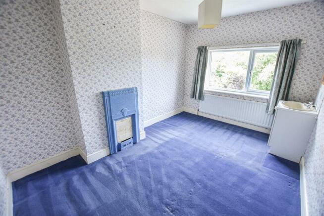 12 The Village - bedroom 2 (brochure).jpg