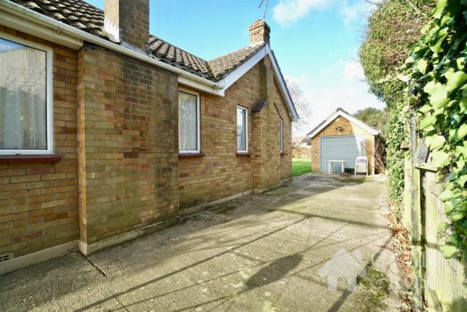 Side drive to garage