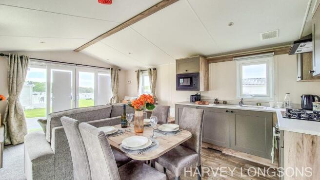 Open-plan living, kitchen and dining area in Wille