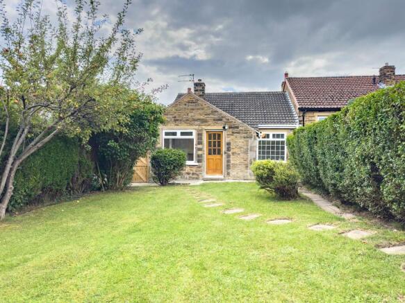 Lawned garden to the rear