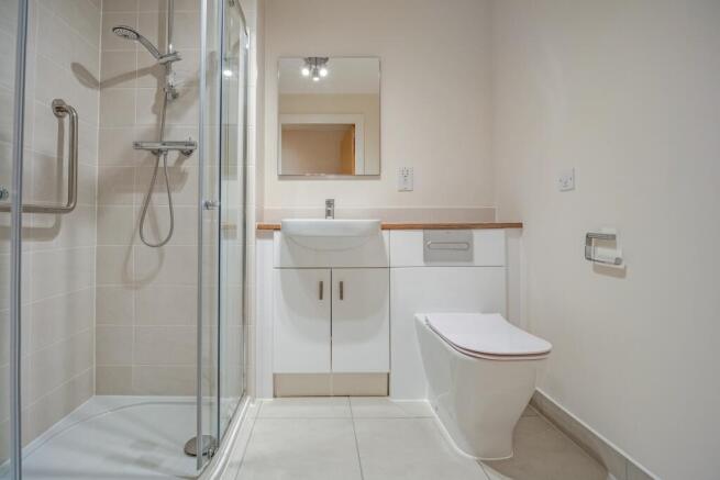 a bathroom with a glass shower