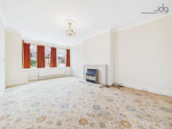 Living Room with Electric Fire and Bay Windows