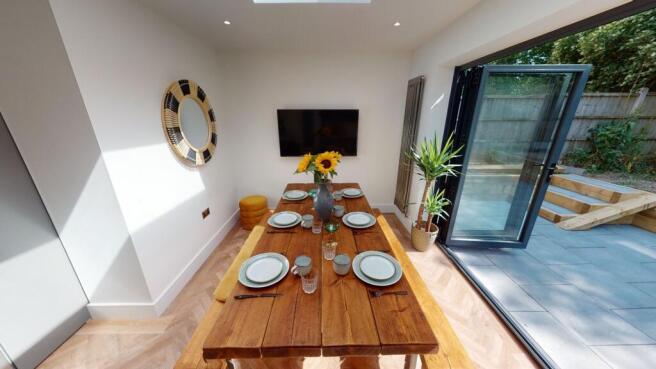 Bright and inviting living area featuring a lar...