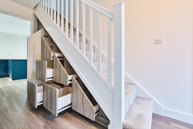 This plot benefits from under stairs storage installed