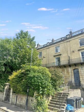 Elegant period home with classic stone facade a...