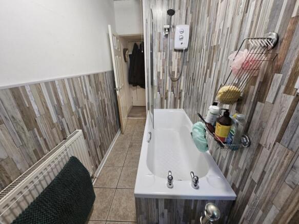 A clean and well-maintained bathroom with a lar...