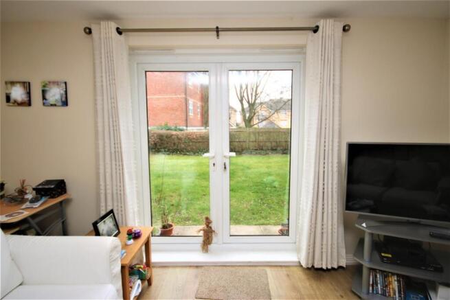 FRENCH DOORS TO COMMUNAL GARDENS: