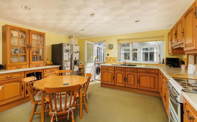 Large kitchen with dining area