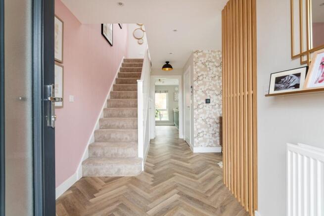 A welcoming entrance that sets a soft, calming first impression