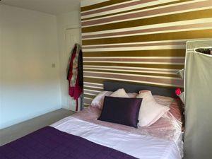 BEDROOM 2 (FRONT MASTER)