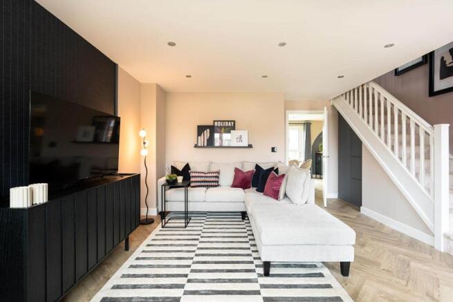 A bright and airy lounge offers space to relax as a family