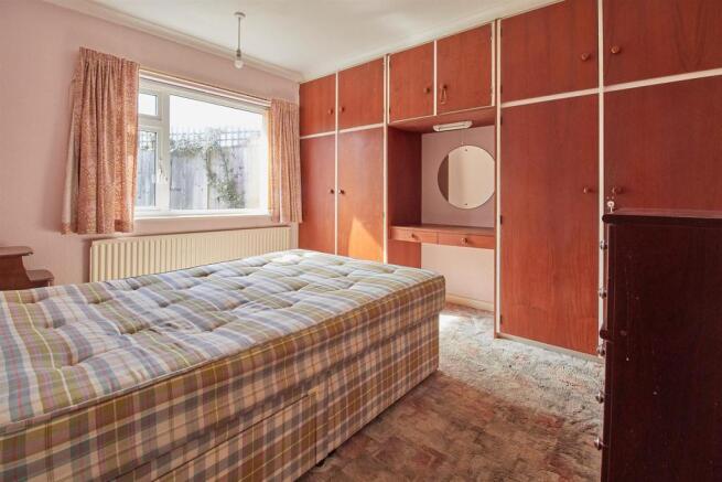 BEDROOM ONE TO REAR