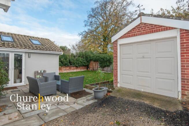 Garage patio + garden