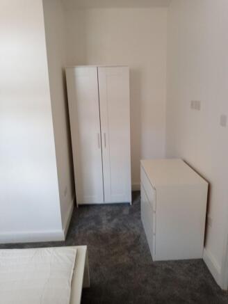 Bright modern room with ample storage space...