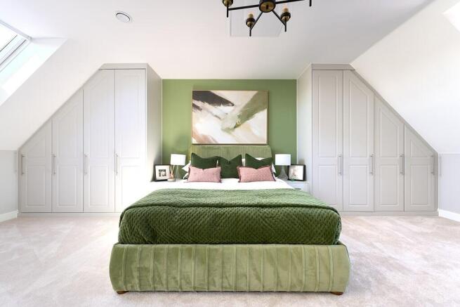 Spacious bedroom 1 spanning the entire second floor