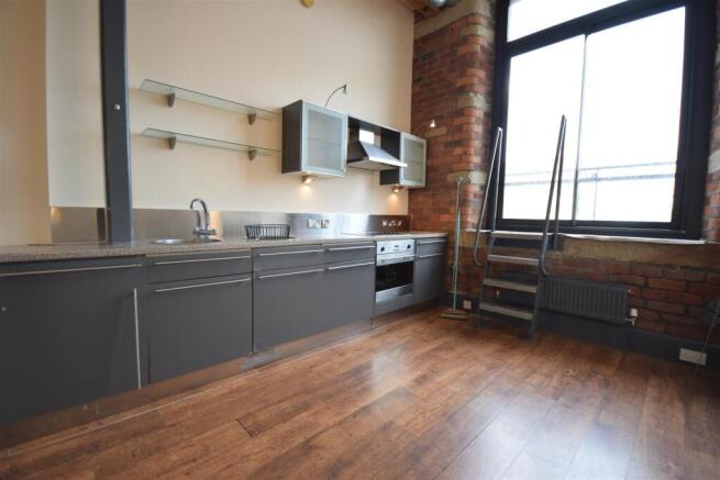 Living, kitchen and bedroom area