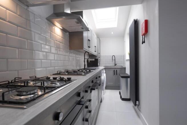A modern and well-equipped kitchen, featuring p...