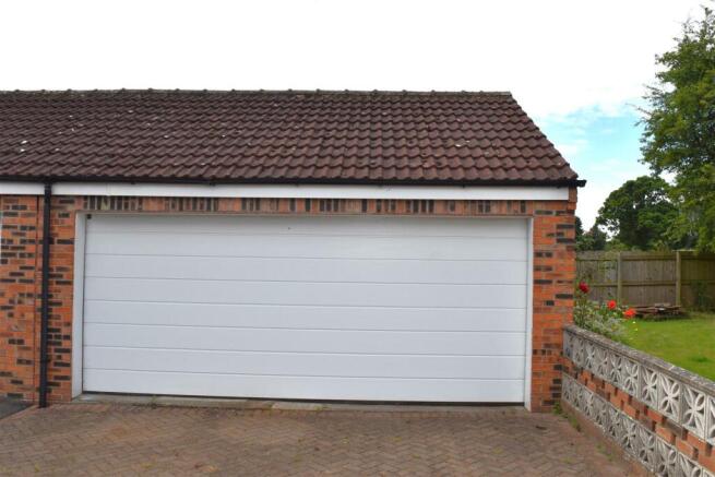 DRIVEWAY AND DOUBLE GARAGE