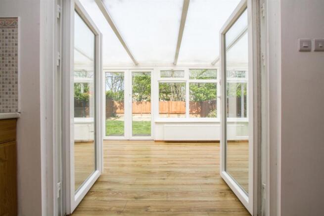 Doors onto Conservatory