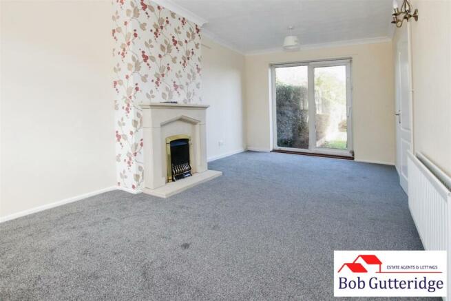 THROUGH LOUNGE/DINING ROOM