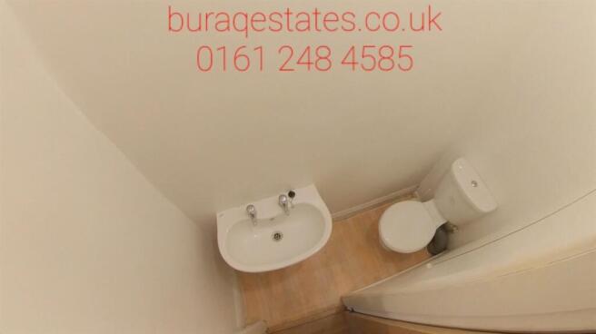 Compact and well-kept WC with a modern pedestal...
