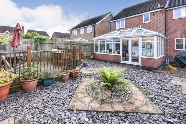 THE REAR GARDEN
