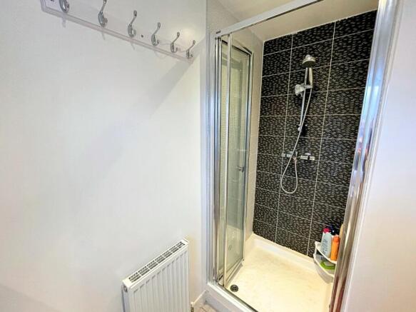 Master bedroom en suite shower. 