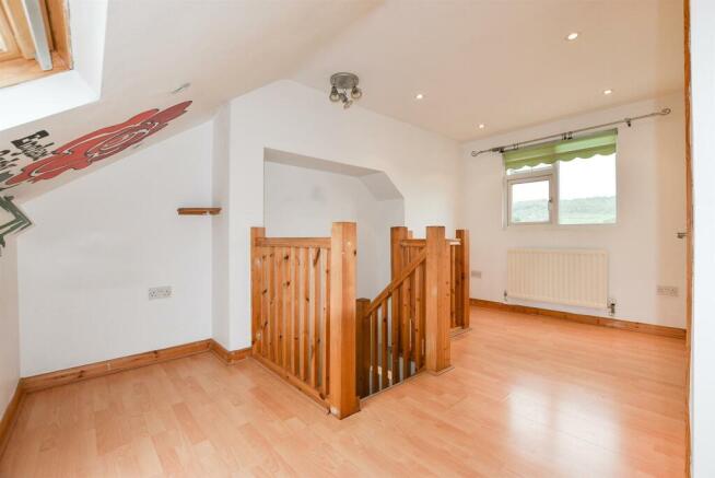 ## Top Floor Bedroom.jpg