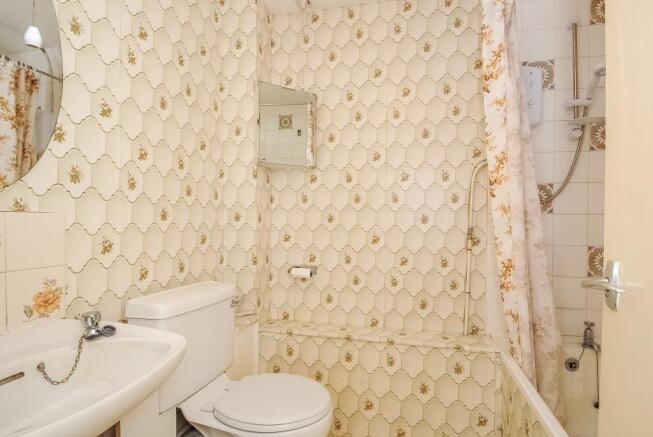 Bathroom with shower over the bath